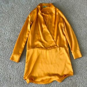 Karlie mustard dress. It has a button if you want it more low cut.